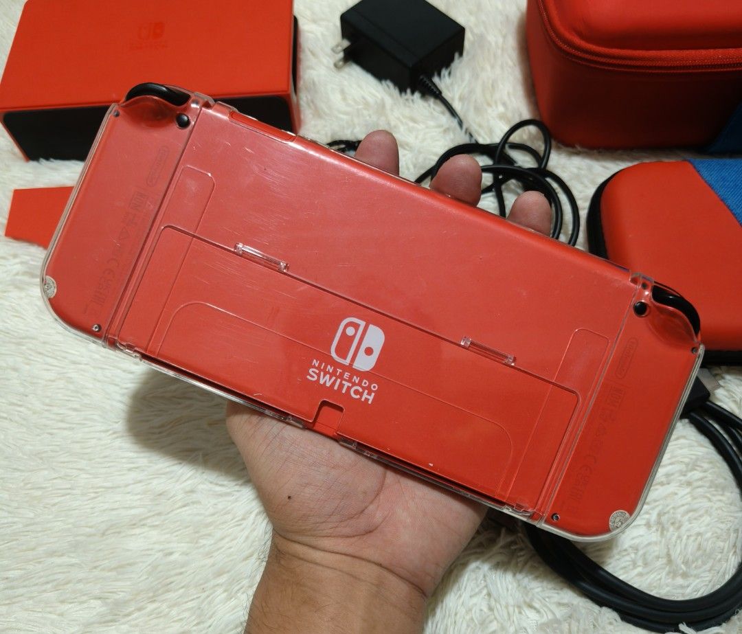 NS OLED LIMITED EDITION (Category: Nintendo) located in Manila. Submitted by zedricksantos (Listing ID 1470197273, Image 2). Description: FOR SALE ‼️ 🎮 Nintendo Switch Oled Mario Red Edition & Pokemon Scarlet & Violet Edition 🎮 OLED MARIO RED Complete accessories Mario Themed Bag & Pouch Clear Case Tempered Glass Installed Since Day 1 No Performance Issue OLED POKEMON SCARLET & VIOLET Complete Accessories Tempered Glass Installed Since Day 1 No