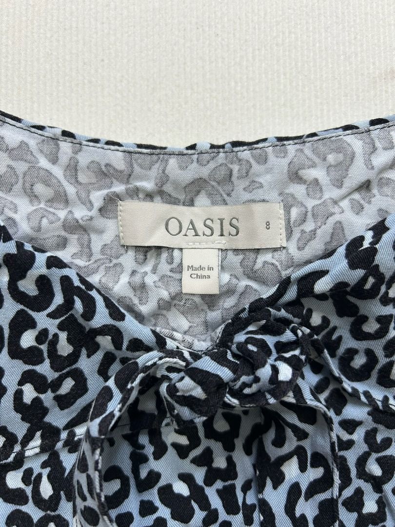Oasis Blue Blouse Cheetah Print (Category: Blouses) located in Quezon City. Submitted by bdmc.clothing (Listing ID 1470253424, Image 2). Description: Brand: Oasis Type of Clothing: Blouse Size on tag: Medium Issues: none Condition: Like new Fabric: 100% Cotton Price: 300.