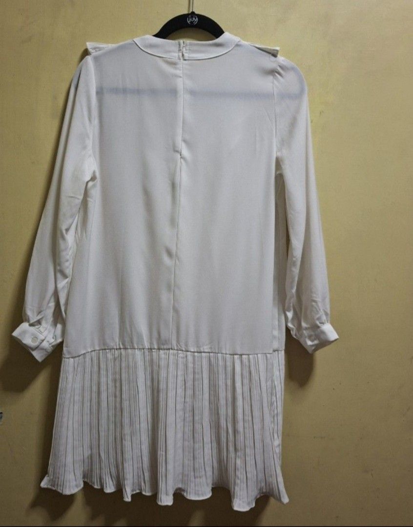 Off White Korean Dress (Category: Dresses) located in Manila. Submitted by thrifter_lifestyle (Listing ID 1470164155, Image 2). Description: Brand: See Tag 🙂 (bought in Korea) Long sleeves Zipper in back Pretty Ruffles on deck and skirt (see photo) Slightly above knee- length Can be worn as is, but also perfect with tights or pants Actual Color: Ecru / Off White B: 40" W: 40" L: 34" No issues 😀 RFS: no longer fits me, so no worn photos..