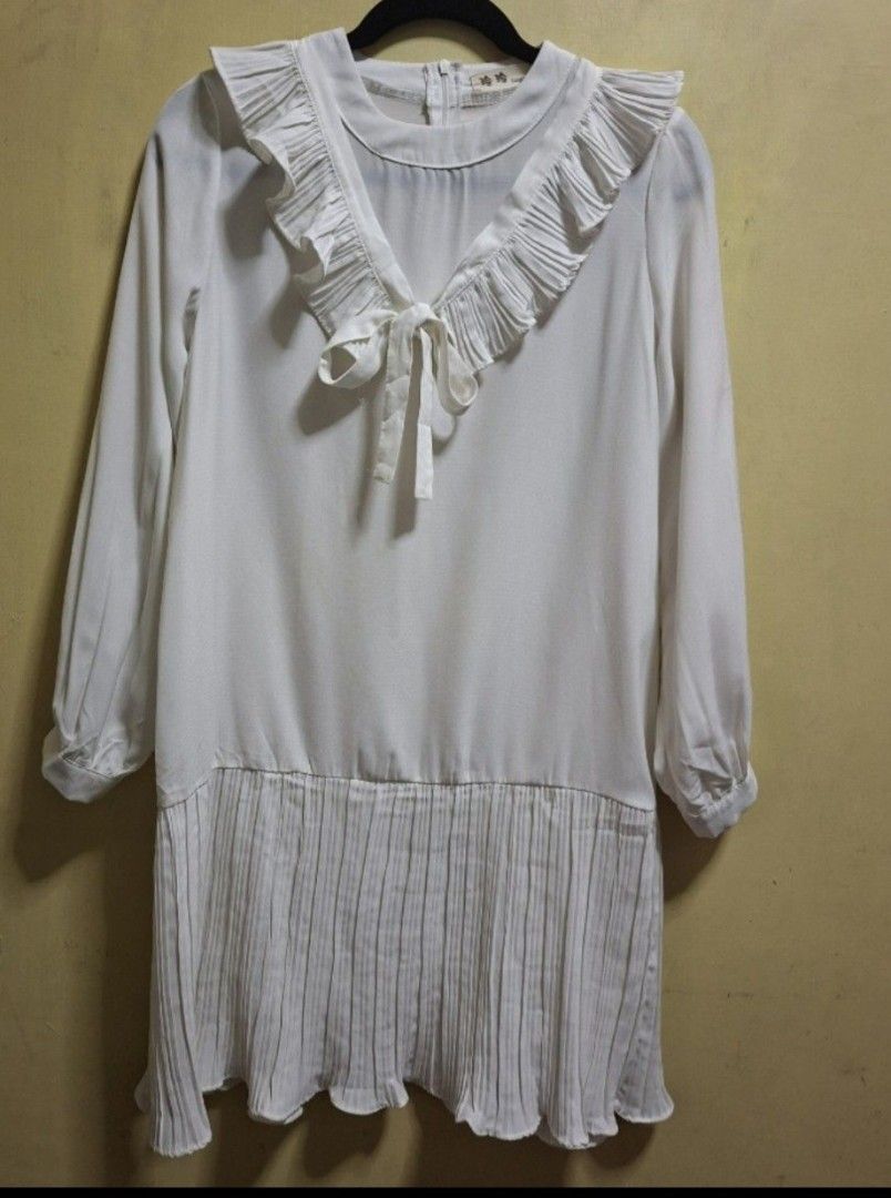 Off White Korean Dress (Category: Dresses) located in Manila. Submitted by thrifter_lifestyle (Listing ID 1470164155, Image 1). Description: Brand: See Tag 🙂 (bought in Korea) Long sleeves Zipper in back Pretty Ruffles on deck and skirt (see photo) Slightly above knee- length Can be worn as is, but also perfect with tights or pants Actual Color: Ecru / Off White B: 40" W: 40" L: 34" No issues 😀 RFS: no longer fits me, so no worn photos..