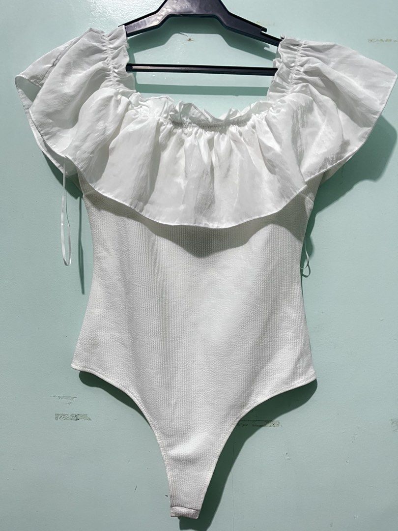 Off-Shoulder One Piece Swimsuit (Category: Bikinis & Swimsuits) located in Lucena. Submitted by needfundsforojt (Listing ID 1470295265, Image 1). Description: (Personal Preloved) White off-shoulder ribbed bodysuit - color grade: 10/10 - no flaw NO COD! PAYMENT FIRST 😊 MOP: Gcash/Landbank/Gotyme Bank.