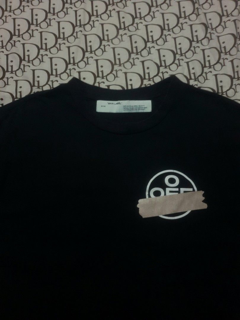 Off-white tape tshirt (Category: Tshirts & Polo Shirts ) located in San Fernando. Submitted by retro.district. (Listing ID 1470346617, Image 3). Description: - Off-white Tape tshirt - Size: XL(24x29) - Condition: Excellent - Issue: hairlines - Color Rate: 9.5/10.