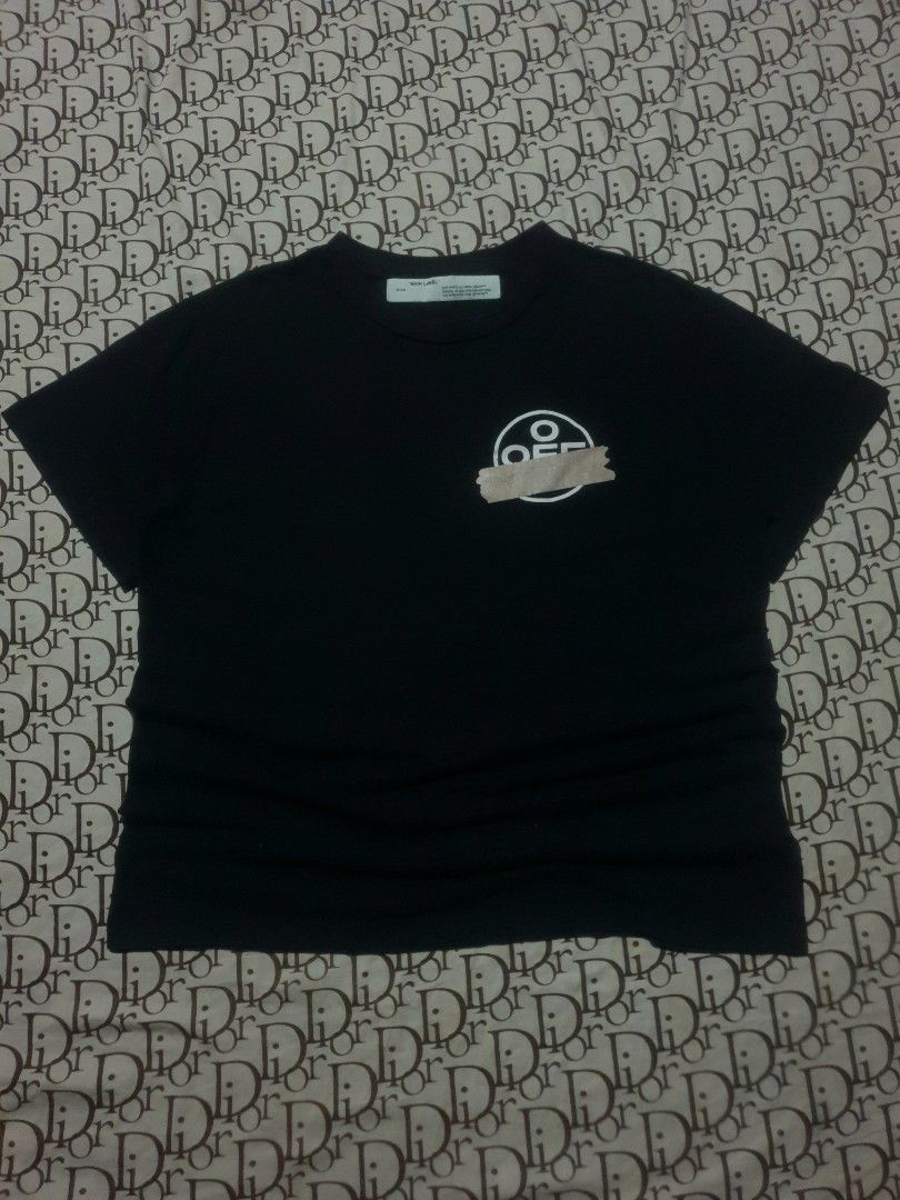 Off-white tape tshirt (Category: Tshirts & Polo Shirts ) located in San Fernando. Submitted by retro.district. (Listing ID 1470346617, Image 2). Description: - Off-white Tape tshirt - Size: XL(24x29) - Condition: Excellent - Issue: hairlines - Color Rate: 9.5/10.