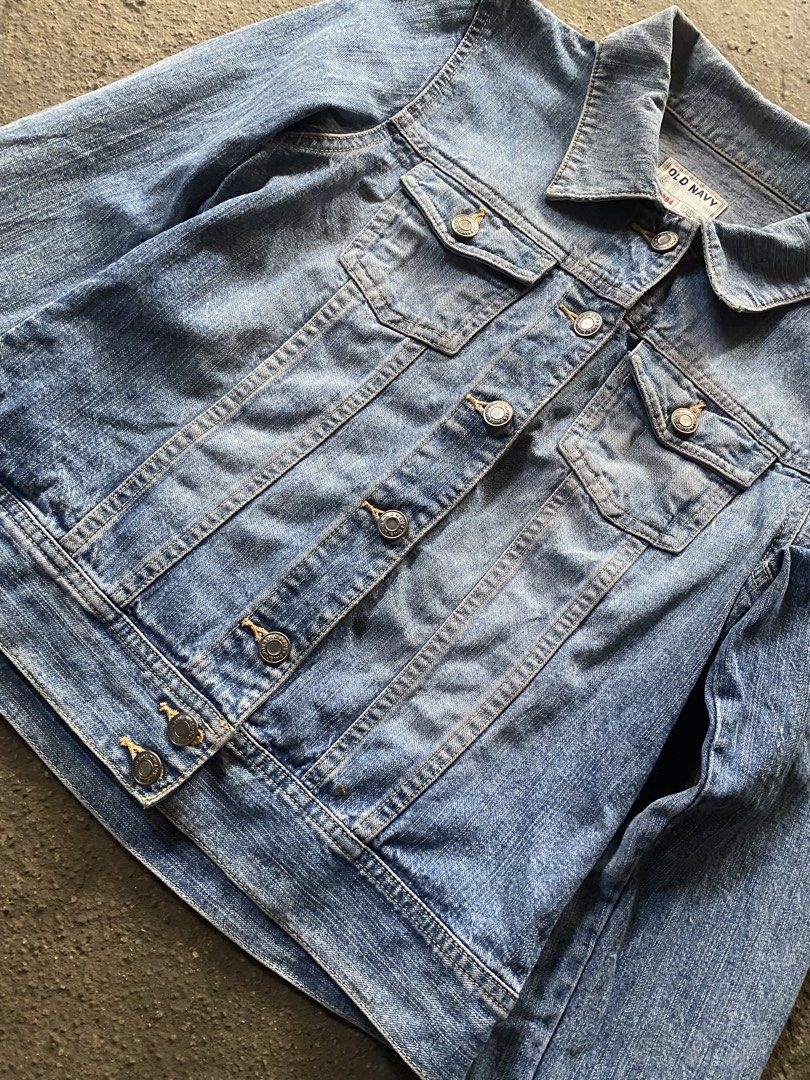 Old Navy Denim Jacket Blue Size M (Category: Coats, Jackets and Outerwear) located in Caloocan City. Submitted by remythrift (Listing ID 1470188886, Image 2). Description: - Brand: Old Navy - Size: Medium - Material: 100% Cotton (Made in Indonesia) - Design: Classic collar, button-up front, two chest pockets - Style: Versatile basic layering piece for tees or dresses.