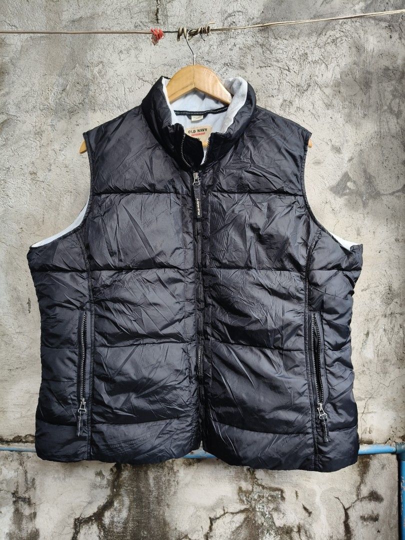 Old Navy Outerwear Puffer Jacket (Category: Coats, Jackets and Outerwear) located in Makati City. Submitted by thriftersmakati (Listing ID 1470148066, Image 1). Description: - Brand: Old Navy - Color: Classic Black - Material: Quilted nylon outer shell with soft, cozy fleece lining - Features: High collar, full zip front, branded zipper pull.