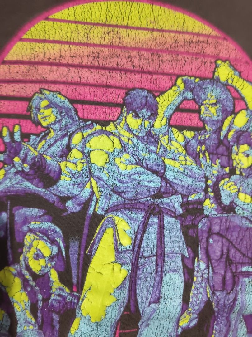 Old Navy Street Fighter Graphic Tee Size L (Category: Tshirts & Polo Shirts ) located in Manila. Submitted by icesummer.onlineshop (Listing ID 1470154257, Image 3). Description: - Brand: Old Navy - Item: Street Fighter Graphic T-Shirt - Color: Grey - Size: Large - Design: Classic Street Fighter characters with retro synthwave sunset background and intentional vintage crackle texture - Details: short sleeves - Origin: Made in Nicaragua (Production