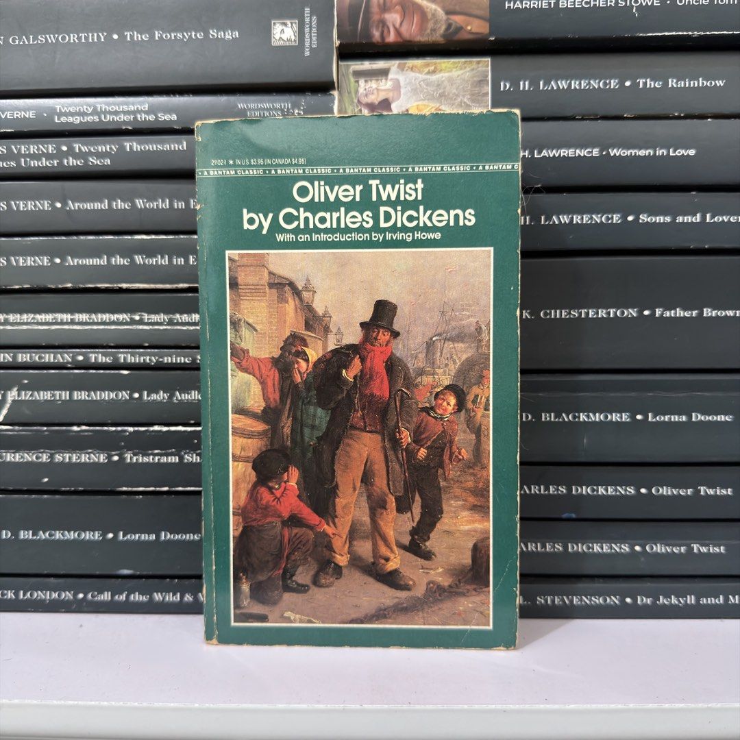 Oliver Twist by Charles Dickens Bantam Classic Paperback (Category: Storybooks) located in Lingayen. Submitted by readwjane (Listing ID 1470153446, Image 1). Description: - Title: Oliver Twist by Charles Dickens - Edition: Bantam Classic (with introduction by Irving Howe) - Cover: Green cover featuring a classic street illustration - Condition: Normal shelf and reading wear on edges; text pages are fully intact - Perfect for: Students, fiction re