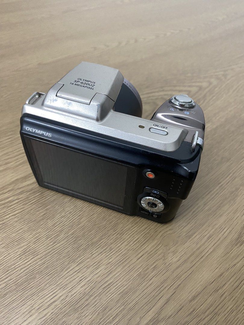 Olympus Digital Camera | Vintage Digicam (Category: Cameras) located in Taguig. Submitted by gigichua_preloved (Listing ID 1470330637, Image 2). Description: - Model: Olympus SP-620UZ Digital Camera (Silver & Black) - Resolution: 16 Megapixels with 21x Wide Optical Zoom - Function: Capture high resolution photos and vintage videos - Condition: Fully working, powers up, captures clear shots, and display works great - Included Accessories: Lens cap