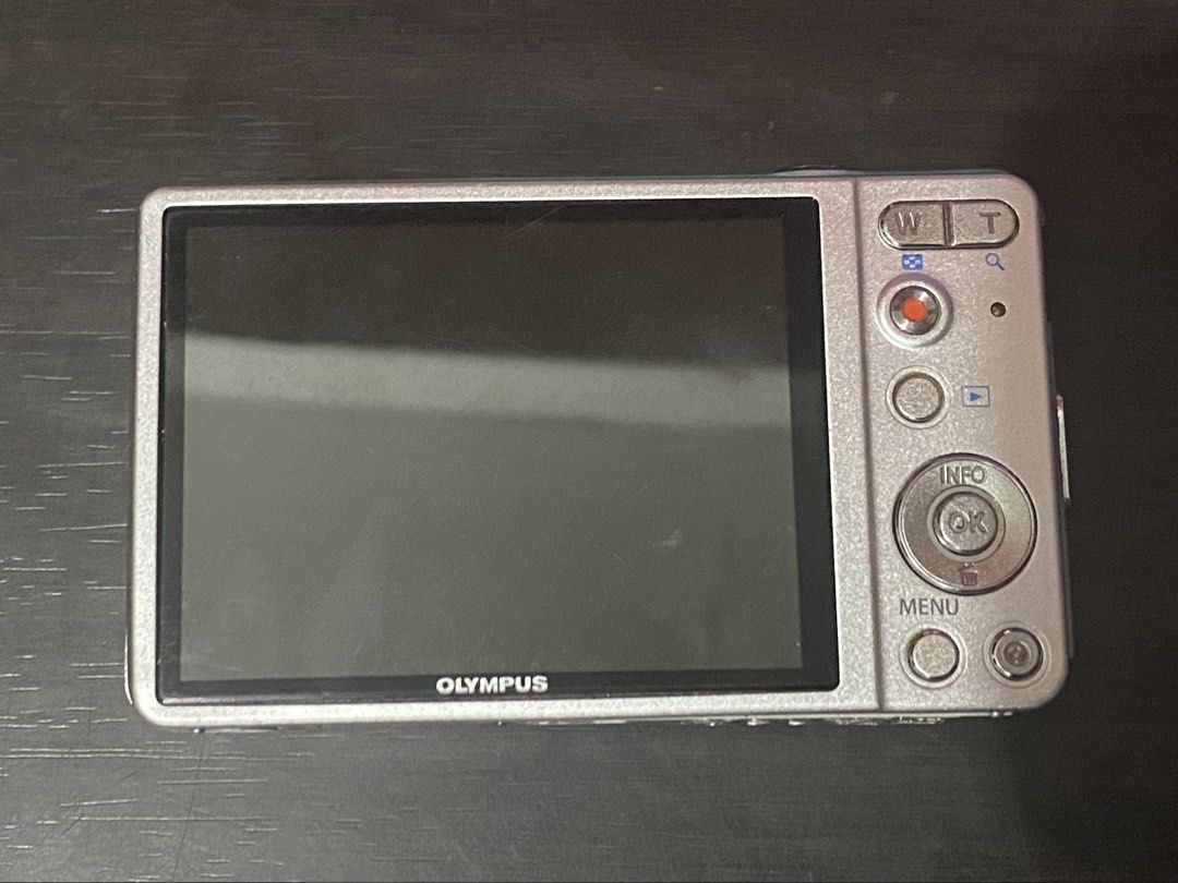 Olympus VG-130 Silver 14MP Digital Camera (Category: Cameras) located in Manila. Submitted by myiao (Listing ID 1470296333, Image 2). Description: Olympus VG-130 Silver 14 Megapixels Digital Camera - can both capture and record CONDITION: Body condition - 9/10 - ALL buttons working - Flash working - Red light working - Zoom working - Minor lcd issue (shows one line, doesnt affect output) - Cracks on battery door, but still locks properly INCLUSIO