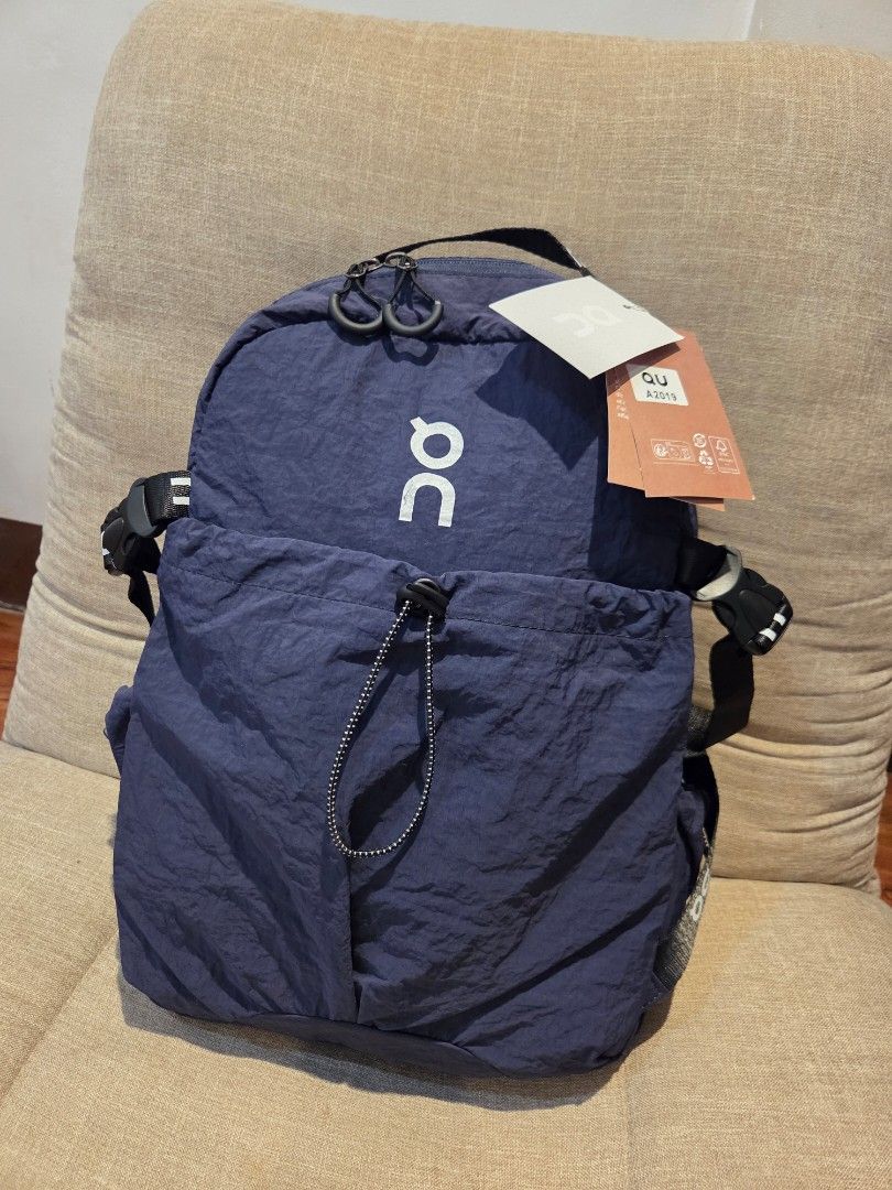 On Running Waist Pack Lite 2L (Category: Belt bags, Clutches and Pouches) located in Manila. Submitted by mysticrabbit.284012 (Listing ID 1470147332, Image 1). Description: - Brand new with original tags still attached - Color: Dark navy blue - Capacity: 2 liters (super lightweight at only 110g) - Comfortable, breathable mesh back padding with adjustable strap - Secure main zippered compartment plus front slip pocket with bungee cord closure.