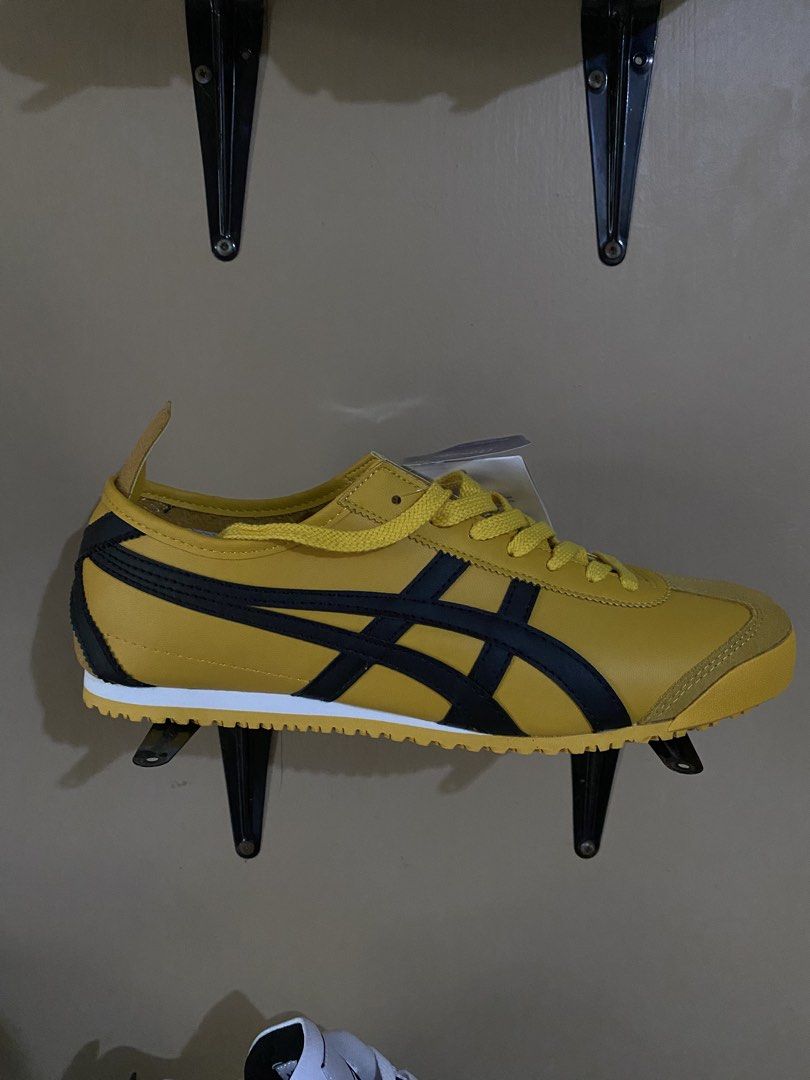 Onitsuka Tiger Mexico 66 Yellow Black (Category: Sneakers) located in Manila. Submitted by rovinxrx (Listing ID 1470294698, Image 1). Description: - Brand new with retail tag attached - Iconic yellow and black colorway with matching yellow laces - Classic slim profile design - Clean white midsole - Premium suede accents at the toe and heel.