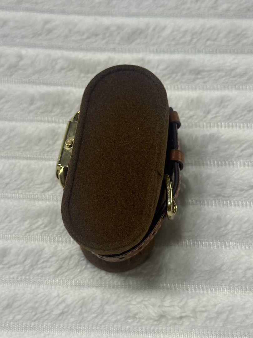 ORIGINAL COACH CADIE 14504029 (Category: Women's Watches) located in Manila. Submitted by fatz91 (Listing ID 1470220519, Image 3). Description: ORIGINAL COACH CADIE 14504029 Specifications: Movement-Quartz (battery-powered) Case material-Stainless steel, gold-tone finish Dial-White mother-of-pearl Case shape-Rectangular Case thickness-Approximately 6 mm Strap-Brown calf leather Glass-Mineral crystal Water resistance-3 ATM / 30 metres Display-Anal