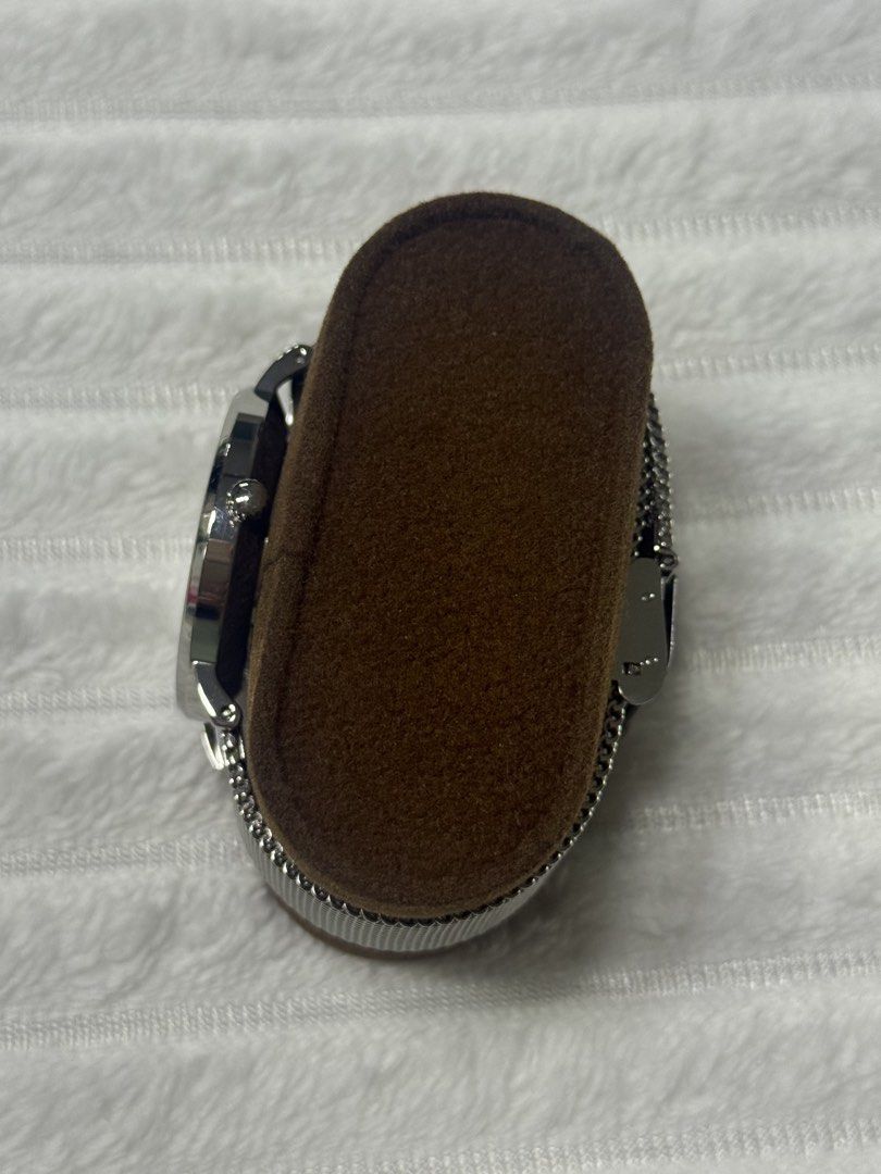 ORIGINAL Coach Perry 14504100 Watch (Category: Women's Watches) located in Manila. Submitted by fatz91 (Listing ID 1470218679, Image 2). Description: Coach Perry 14504100 Watch The visual highlight is the white dial with twelve lavender/purple floral markers. That combination gives it more personality than a conventional silver dress watch while remaining fairly understated from a distance; the mesh bracelet also makes it easy to pair with jewelr