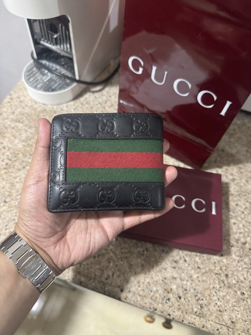 Original Gucci Web Wallet (Category: Wallets & Card Holders) located in Quezon City. Submitted by rg1996 (Listing ID 1470304605, Image 2). Description: Used With replacement gcci dustbag, box, and paper bag Guaranteed original 5750 only Thanks! :).
