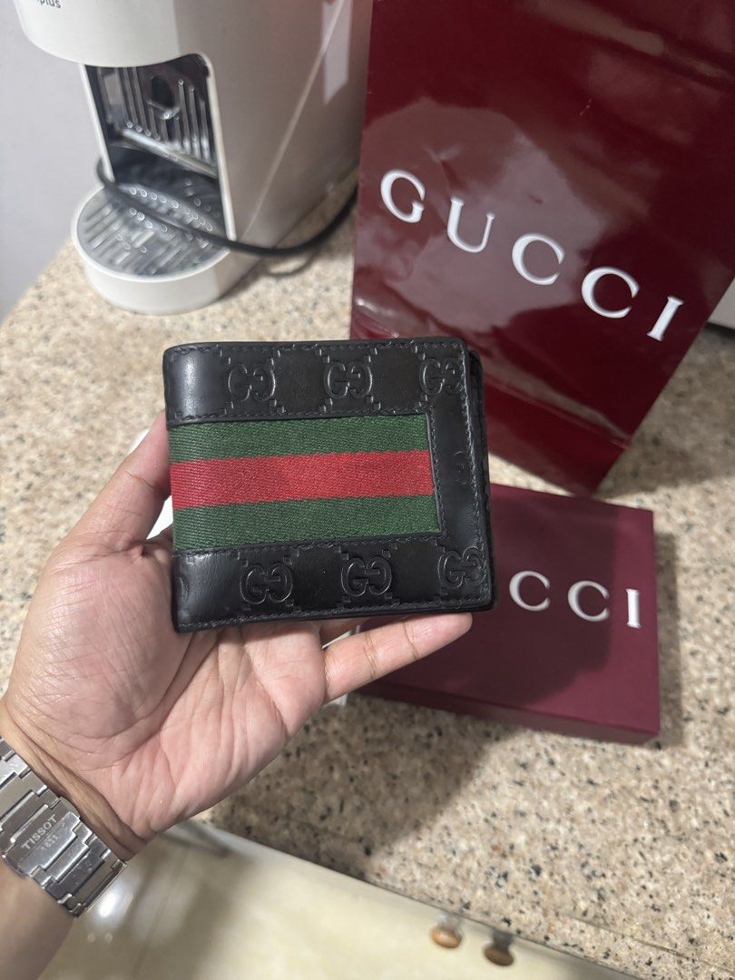 Original Gucci Web Wallet (Category: Wallets & Card Holders) located in Quezon City. Submitted by rg1996 (Listing ID 1470304605, Image 1). Description: Used With replacement gcci dustbag, box, and paper bag Guaranteed original 5750 only Thanks! :).
