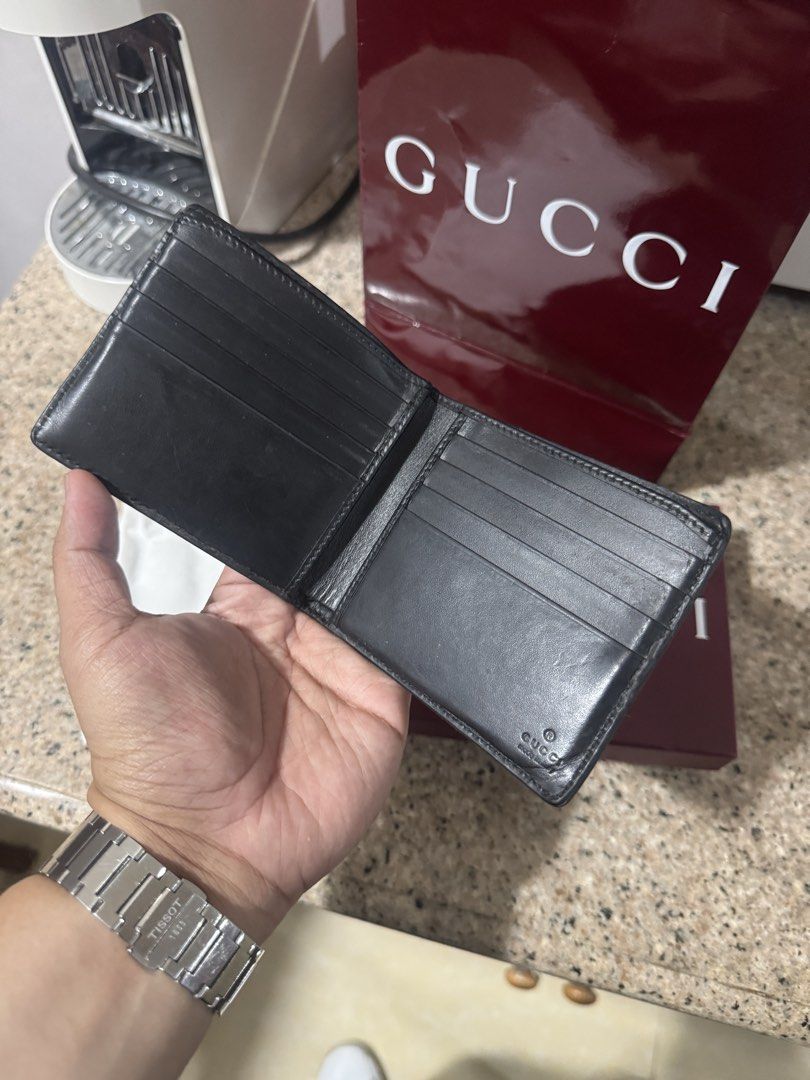 Original Gucci Web Wallet (Category: Wallets & Card Holders) located in Quezon City. Submitted by rg1996 (Listing ID 1470304605, Image 3). Description: Used With replacement gcci dustbag, box, and paper bag Guaranteed original 5750 only Thanks! :).