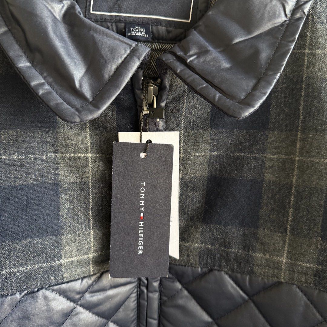 Original Tommy Hilfiger Quilted Jacket (Category: Coats, Jackets and Outerwear) located in San Fernando. Submitted by jorjorr (Listing ID 1470328034, Image 2). Description: Original T*mmy Hilfiger Quilted Jacket Brand new w/ hangtag XL on tag 25 width 30 length No issue P2,599.