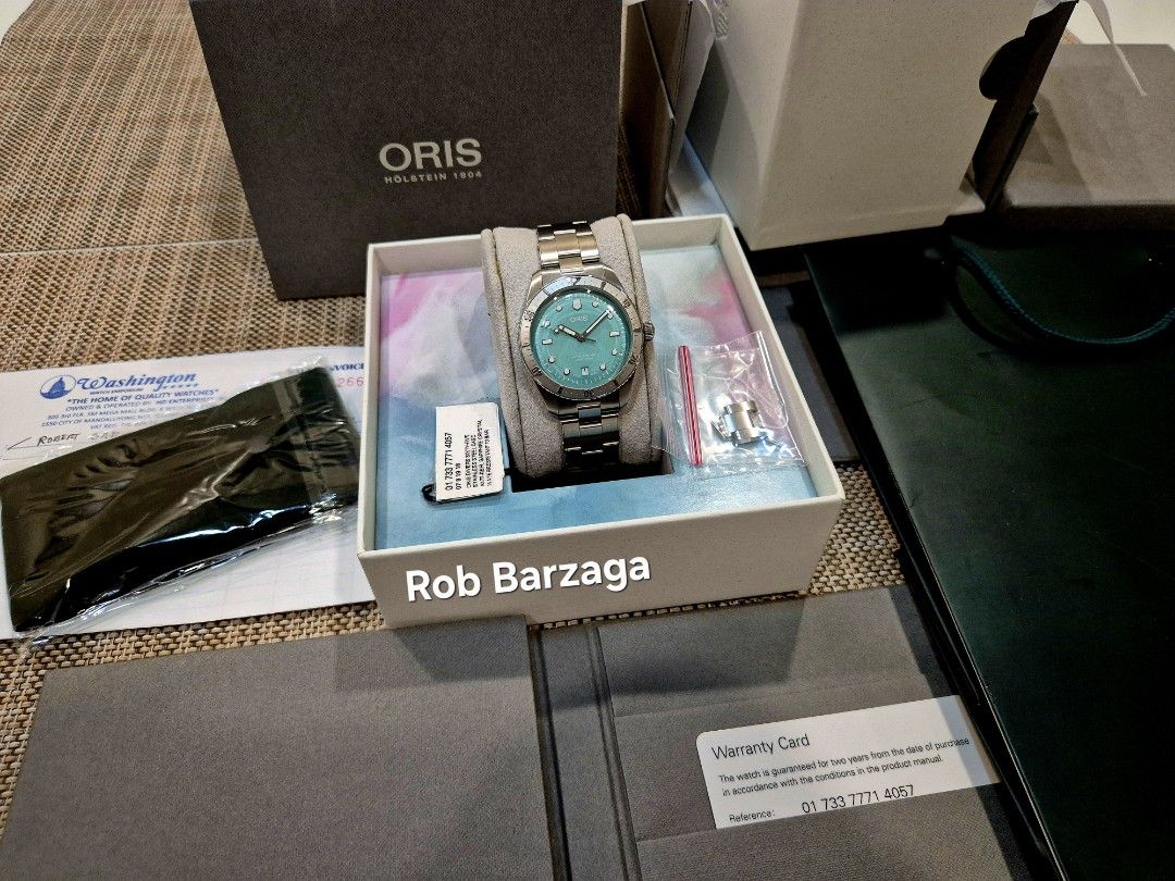 Oris Divers Sixty-Five Cotton Candy Green Tiffany (Category: Luxury Watches) located in Paranaque City. Submitted by fourlinersub (Listing ID 1470297154, Image 2). Description: ORIS Divers Sixty-Five Cotton Candy Green Full set with receipt from AD. Like new. Used less than 10 times. 9.5/10 condition Caseback and bracelet stickers intact. Size: 38 mm Dial: Pastel/ "Tiffany" Green Movement: Oris Caliber 733 (Automatic) Screw-down crown with 100 me
