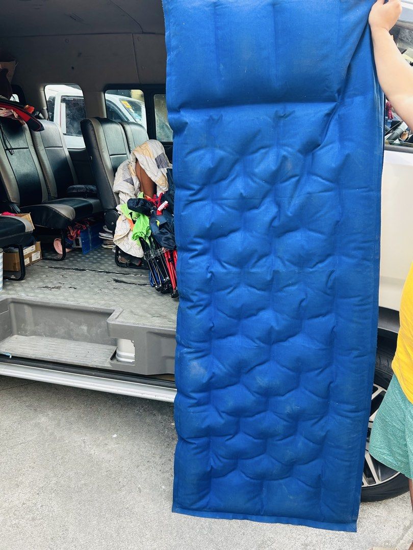 Outbound Camping Sleeping Mat Red Blue (Category: Hiking & Camping) located in Manila. Submitted by starbalesukandjapansurplus (Listing ID 1470347827, Image 2). Description: - Reversible red and blue design - Built-in pillow section at the top for extra convenience - Padded and quilted surface for maximum comfort - Folds or rolls up easily for compact storage and travel - Durable material on both sides - Perfect for camping, road trips, and guest