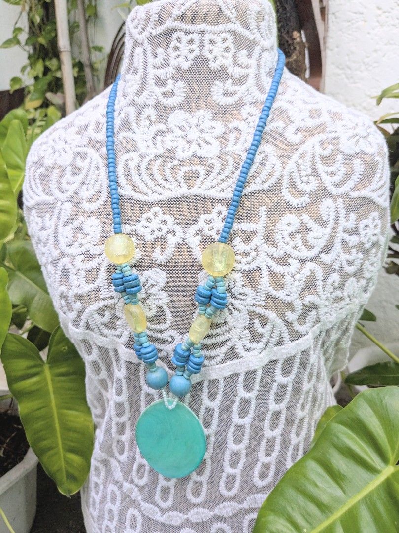 Oval Shell Pendant (Blue) Handcrafted Necklace (Category: Necklaces) located in Las Pinas. Submitted by amisells (Listing ID 1470224004, Image 2). Description: ⋆⊱༻𖥸༺⊰⋆ every piece in our collection is thoughtfully handcrafted using an exquisite selection of locally sourced natural materials! discover the beauty of authentic craftsmanship through coconut heishi beads, lumbang seed beads, bayong and gmelina wood beads, coco side-drill beads, one-e