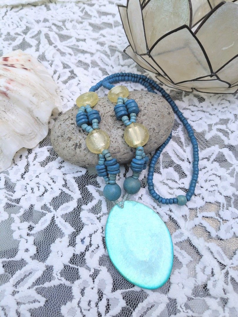 Oval Shell Pendant (Blue) Handcrafted Necklace (Category: Necklaces) located in Las Pinas. Submitted by amisells (Listing ID 1470224004, Image 3). Description: ⋆⊱༻𖥸༺⊰⋆ every piece in our collection is thoughtfully handcrafted using an exquisite selection of locally sourced natural materials! discover the beauty of authentic craftsmanship through coconut heishi beads, lumbang seed beads, bayong and gmelina wood beads, coco side-drill beads, one-e