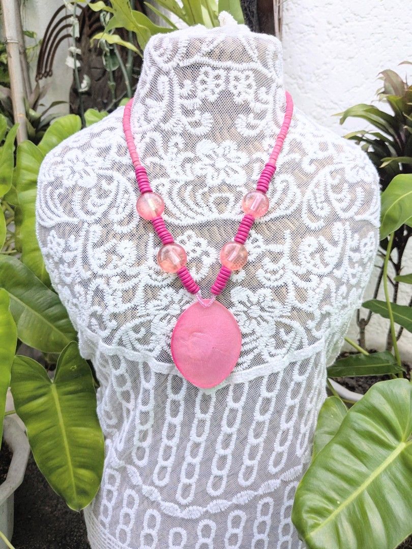 Oval Shell Pendant (Pink) Handcrafted Necklace (Category: Necklaces) located in Las Pinas. Submitted by amisells (Listing ID 1470223782, Image 1). Description: ⋆⊱༻𖥸༺⊰⋆ every piece in our collection is thoughtfully handcrafted using an exquisite selection of locally sourced natural materials! discover the beauty of authentic craftsmanship through coconut heishi beads, lumbang seed beads, bayong and gmelina wood beads, coco side-drill beads, one-e