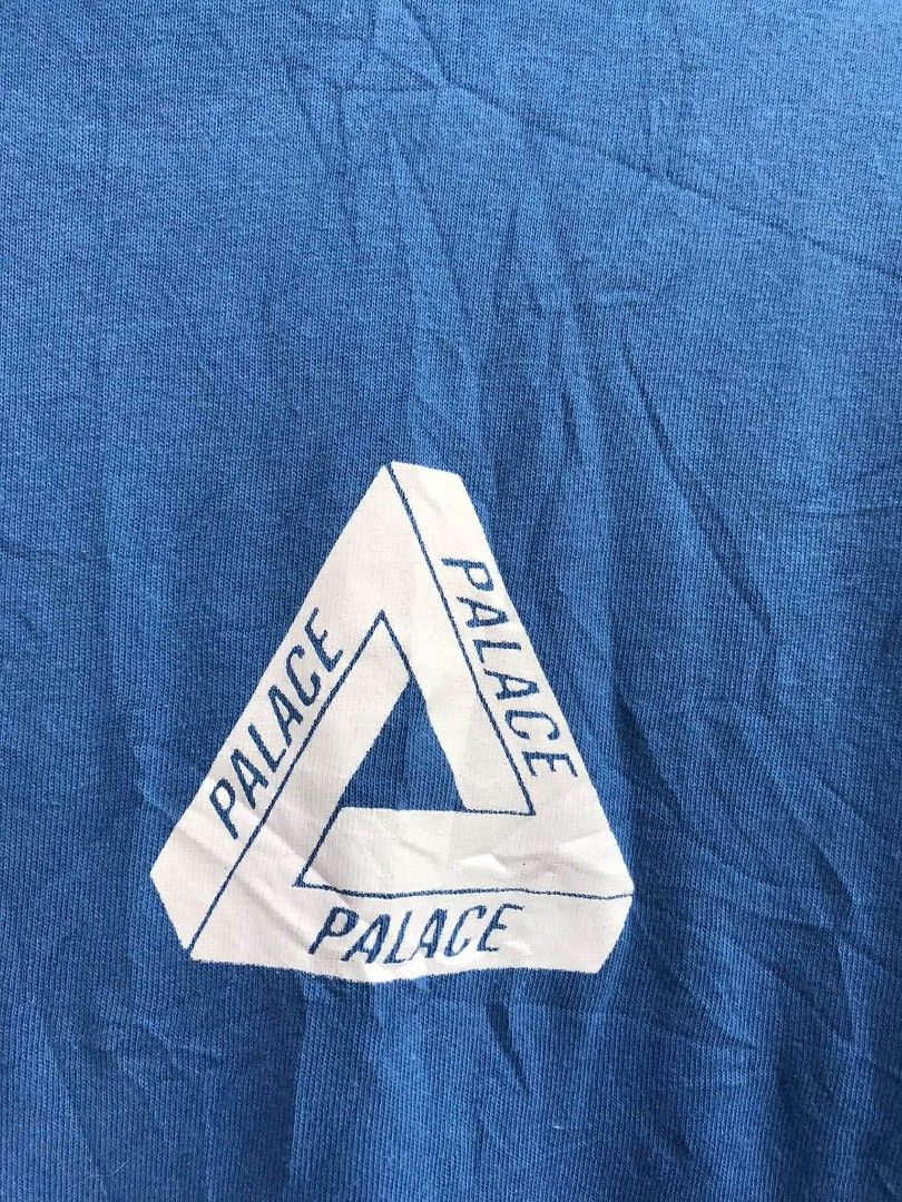 Palace Blue Tri-Ferg Tee (Category: Tshirts & Polo Shirts ) located in Camiling. Submitted by akosiano (Listing ID 1470156793, Image 3). Description: - Brand: Palace - Size: Large - Design: Classic small tri-ferg logo on the chest, giant tri-ferg graphic on the back - Details: Clean white neck tag with size tab attached - Material: Comfortable cotton - Styling: Great streetwear essential, easy to pair with cargo pants or denim.
