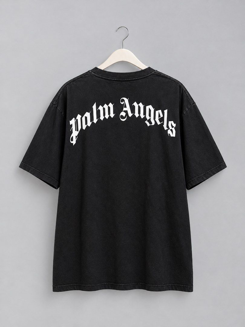 Palm Angels Crocodile Graphic Black Tee Size L (Category: Tshirts & Polo Shirts ) located in Iloilo. Submitted by cloud.thrifts (Listing ID 1470157345, Image 2). Description: - Brand: Palm Angels - Color: Black - Size: Large (L) - Material: 100% Cotton - Design: Severed crocodile graphic with logo on chest, large gothic logo on back - Details: Ribbed collar, straight hem, style code PMBB036F18441027 - Condition: Minor lint on collar ribbing, othe