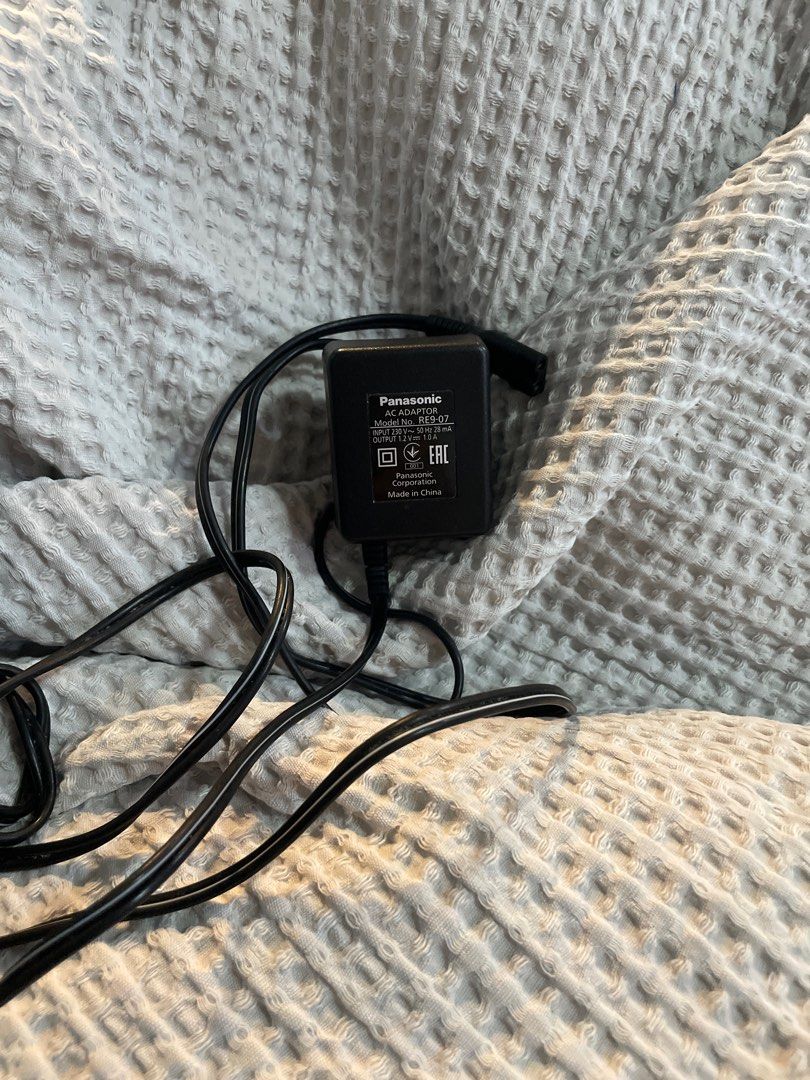 Panasonic AC Adaptor Model No. RE9-07 (Category: Everything Else Others) located in Las Pinas. Submitted by yourneighbortotoro (Listing ID 1470220289, Image 2). Description: Panasonic AC Adaptor Model No. RE9-07 ⚡ Genuine Panasonic AC power supply adapter designed for electric shavers, hair trimmers, and grooming devices. 🔹 Title: Panasonic AC Adaptor Model RE9-07 (1.2V 1.0A) 🔹 Brand: Panasonic 🔹 Model No.: RE9-07 🔹 Input Specs: 230V ~ 50Hz 2