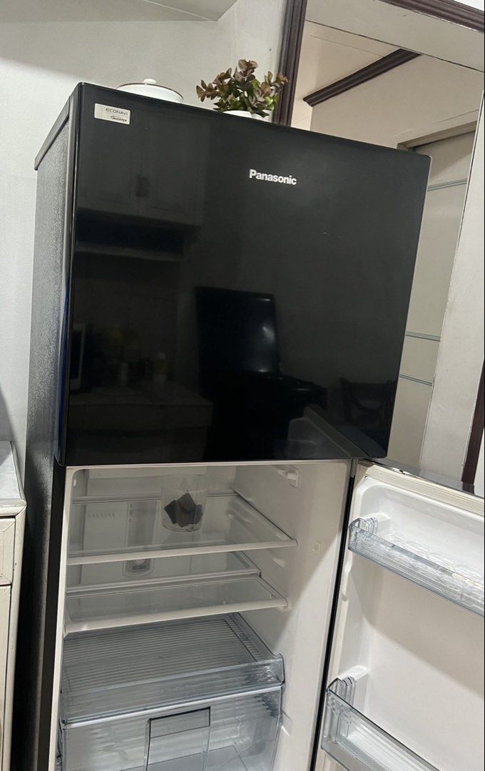 Panasonic Econavi Inverter NR-BL268 Refrigerator (Category: Refrigerators and Freezers) located in Mandaluyong City. Submitted by nadsfranco (Listing ID 1470194539, Image 3). Description: - Brand/Model: Panasonic NR-BL268 Double Door Refrigerator - Technology: Econavi Inverter for energy savings - Capacity: 231L storage volume - Color/Finish: Sleek glossy black - Voltage: 220-240V, 60Hz - Inclusions: Complete with all interior glass shelves, door