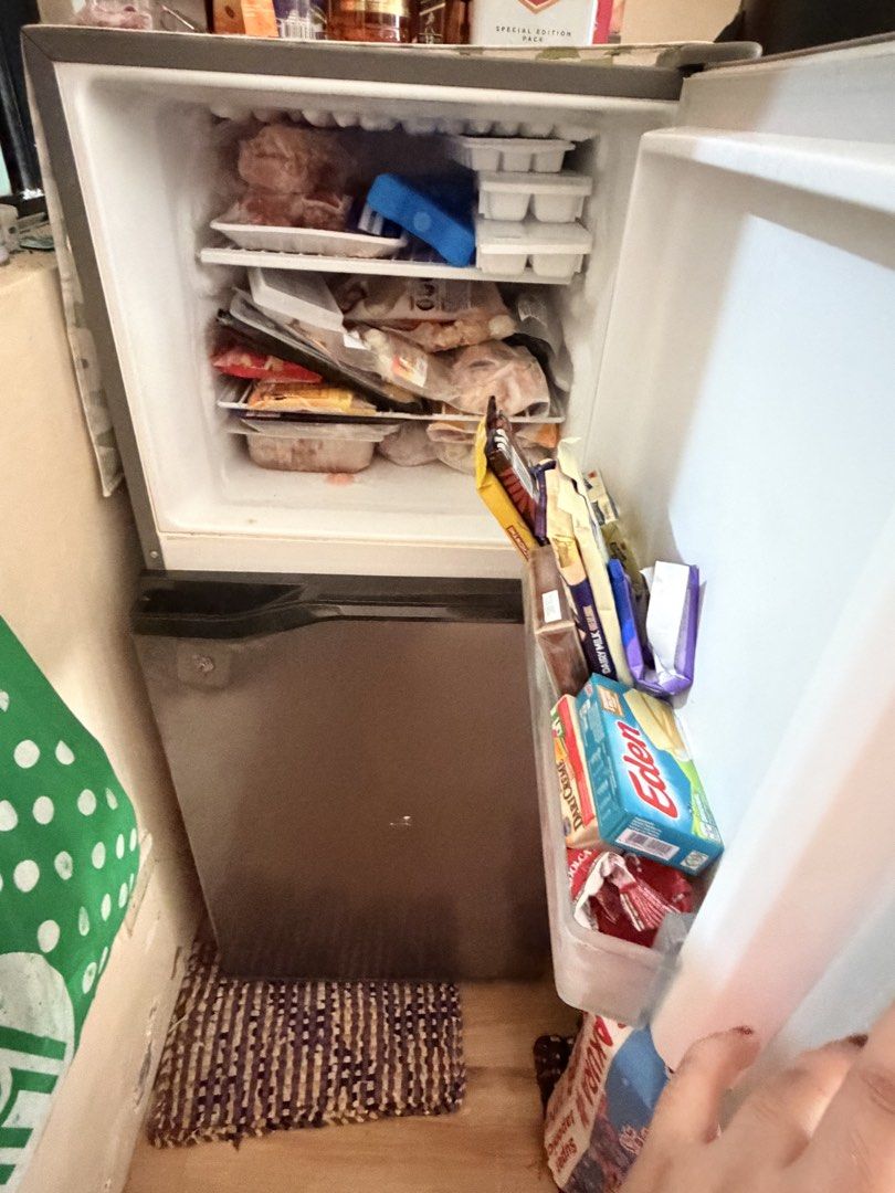 Panasonic Econavi Inverter NR-BQ211VS (Category: Refrigerators and Freezers) located in Imus. Submitted by nabi09 (Listing ID 1470158624, Image 2). Description: - Brand: Panasonic Two-Door Refrigerator - Tech: Econavi Inverter (Energy Saving) - Freezer: Top compartment with ice trays and wire shelving Key Specifications: Model: NR-BQ211VS Type: Direct Cool Inverter Refrigerator (Two-Door) Capacity: 7.6 cu. ft. (Gross Volume: 214 L / Storage Volum
