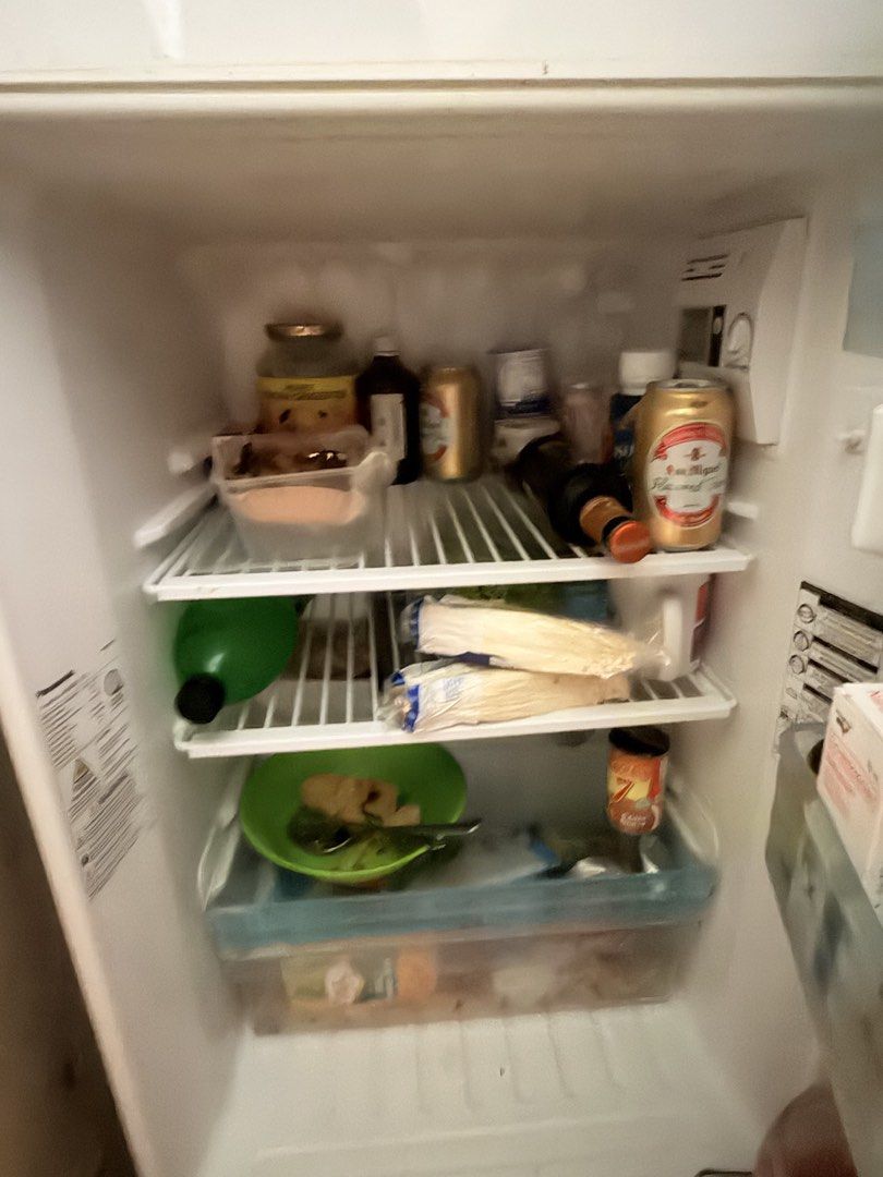 Panasonic Econavi Inverter NR-BQ211VS (Category: Refrigerators and Freezers) located in Imus. Submitted by nabi09 (Listing ID 1470158624, Image 3). Description: - Brand: Panasonic Two-Door Refrigerator - Tech: Econavi Inverter (Energy Saving) - Freezer: Top compartment with ice trays and wire shelving Key Specifications: Model: NR-BQ211VS Type: Direct Cool Inverter Refrigerator (Two-Door) Capacity: 7.6 cu. ft. (Gross Volume: 214 L / Storage Volum