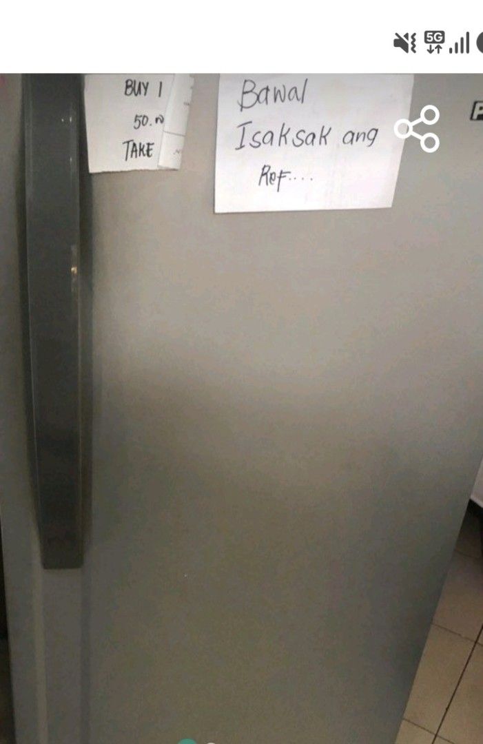 Panasonic Refrigerator Single Door Fridge (Category: Refrigerators and Freezers) located in Marilao. Submitted by marnie.il (Listing ID 1470261260, Image 2). Description: - Brand: Panasonic - Color: Grey finish - Layout: Top freezer compartment with clean interior - Features: Wire shelves, clear door bins, and bottom crisper drawer - Condition Note: Has a handwritten sign taped on front saying 'do not plug in' - Best Use: Great option for extra s