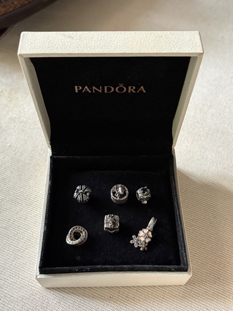 Pandora Charms (₱1,000 each) (Category: Charms) located in Las Pinas. Submitted by cartby_a (Listing ID 1470239980, Image 2). Description: Assorted Authentic Pandora Silver Charms * Available individually or as a set, depending on availability * Individual price: ₱1,000 per charm * Set price: Negotiable * Includes official Pandora boxes in white and black * Condition: Well-maintained and carefully stored Feel free to message me for inquiries or t