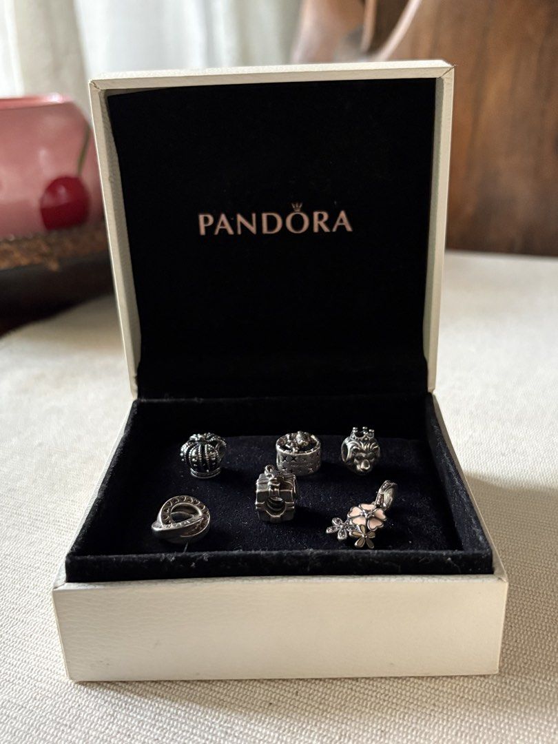 Pandora Charms (₱1,000 each) (Category: Charms) located in Las Pinas. Submitted by cartby_a (Listing ID 1470239980, Image 3). Description: Assorted Authentic Pandora Silver Charms * Available individually or as a set, depending on availability * Individual price: ₱1,000 per charm * Set price: Negotiable * Includes official Pandora boxes in white and black * Condition: Well-maintained and carefully stored Feel free to message me for inquiries or t