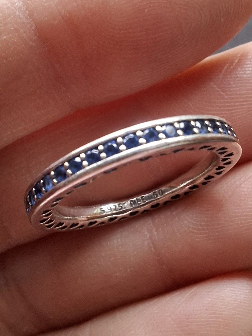 Pandora Radiant Heart Blue Ring (Category: Rings) located in Iloilo. Submitted by mgu.shoppe_ph (Listing ID 1470177383, Image 2). Description: Preloved EUC Size 50 Comes with pouch & pop up box.