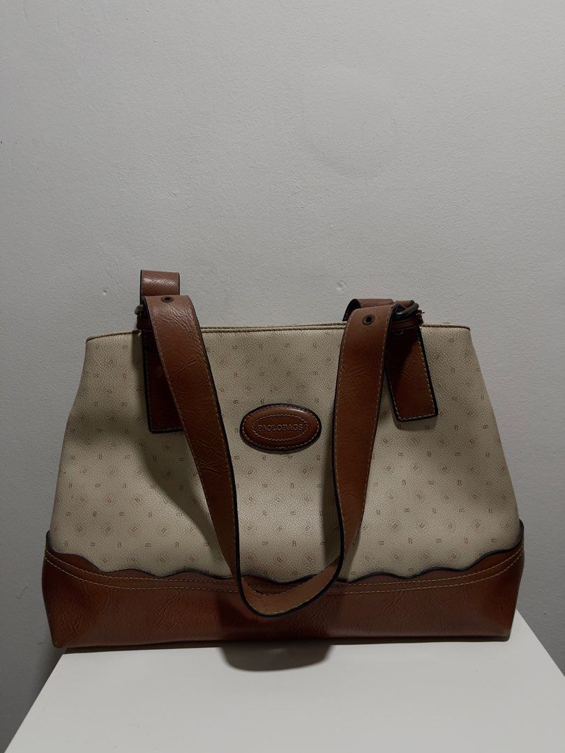 PAOLOBAGS brown + cream patterned shoulder bag (Category: Shoulder Bags) located in Angeles City. Submitted by xiaobunn (Listing ID 1470348097, Image 1). Description: .