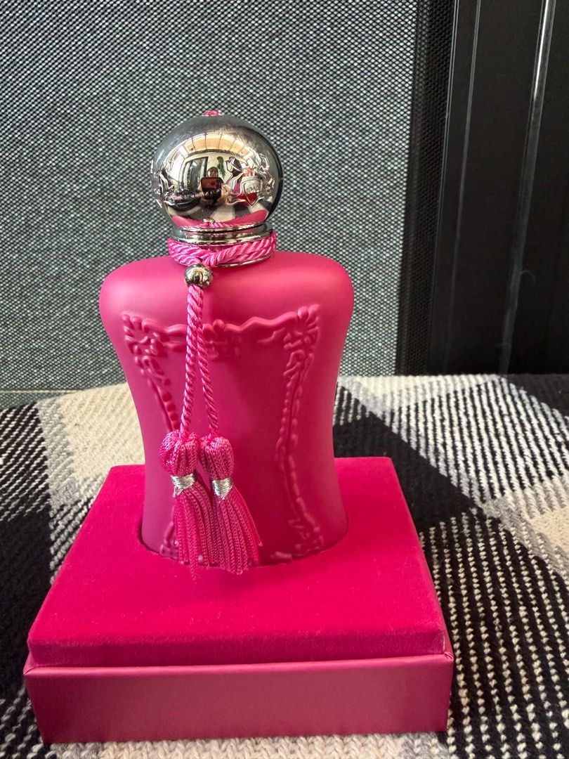 Parfums de Marly Oriana Eau de Parfum 75ml (Category: Fragrance & Deodorants) located in Manila. Submitted by jam_isa21 (Listing ID 1470224842, Image 1). Description: - Brand: Parfums de Marly - Fragrance: Oriana - Size: 75ml - Bottle Design: Vibrant pink frosted glass with silver cap and matching tassels - Packaging: Original velvet presentation box included.