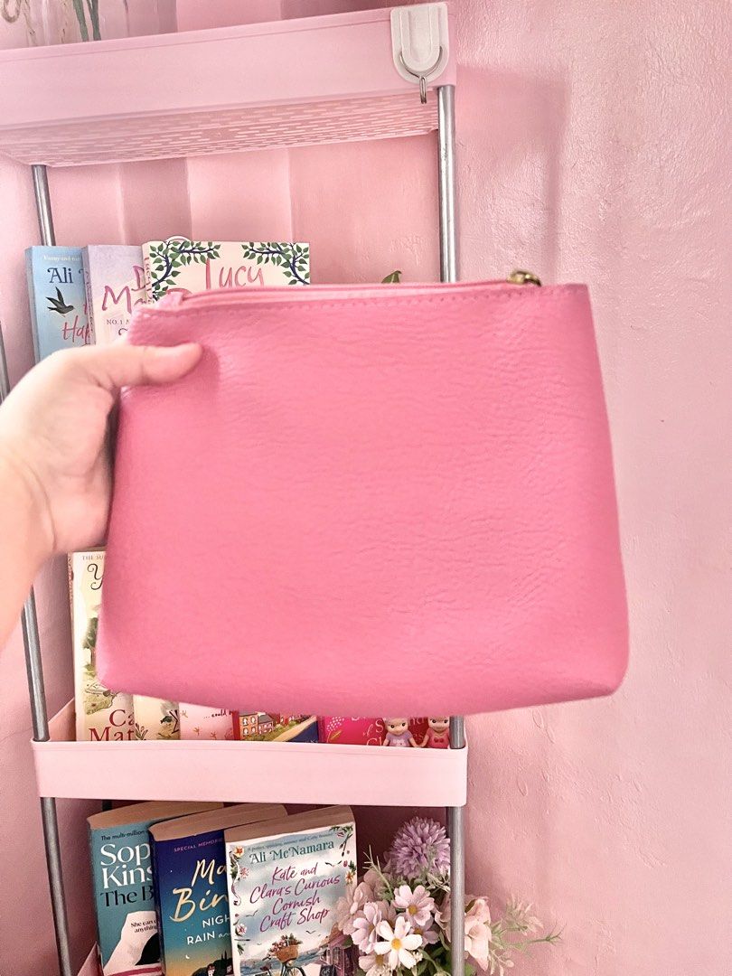 Parisian Pink Shoulder Bag (Category: Shoulder Bags) located in Imus. Submitted by muyingyingyinggg (Listing ID 1470237361, Image 2). Description: - Brand: Parisian - Color: Bright pink - Material: Soft textured material with stylish front panel stitching - Closure: Zipper with branded gold-toned metal pull - Interior: Spacious matching pink interior for daily essentials - Strap: Comfortable drop strap that easily fits over the shoulder - Conditi