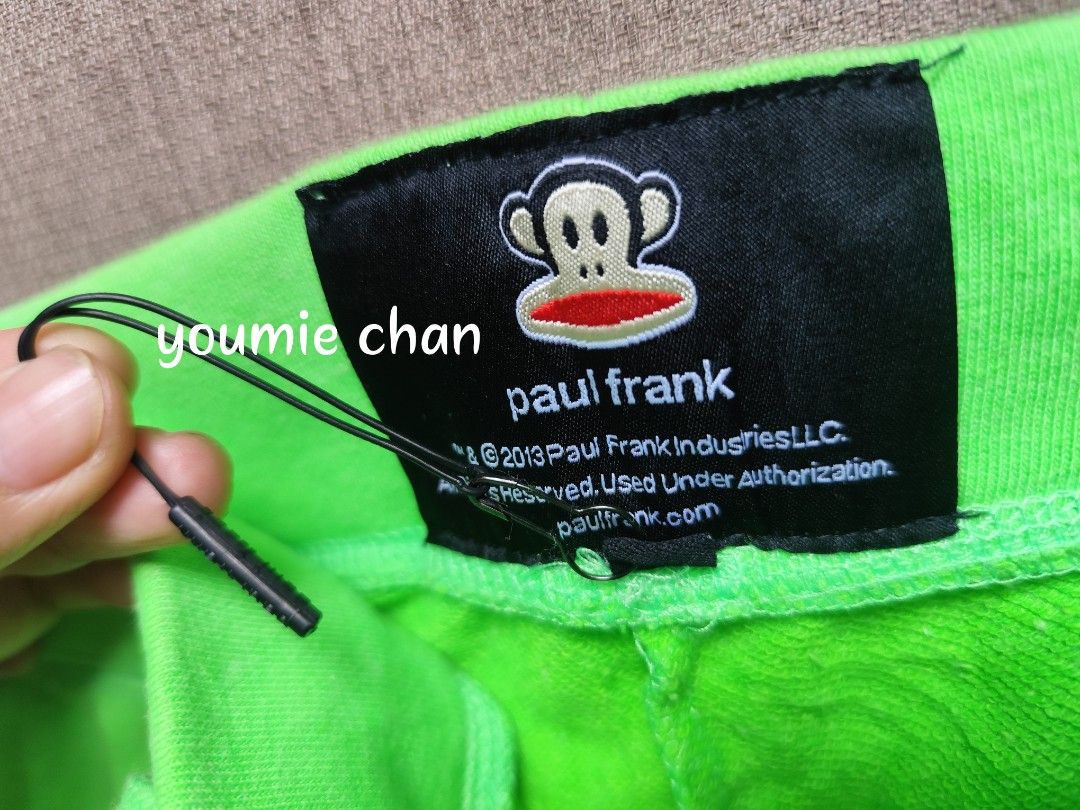 Paul Frank Green Casual Shorts with Drawstring (Category: Shorts) located in Davao. Submitted by youmiechan (Listing ID 1470180490, Image 2). Description: - Brand: Paul Frank - Color: Bright green - Material: Soft, comfortable cotton - Features: Embroidered monkey patch on the right pocket - Waistband: Elastic with matching green drawstring - Pockets: Convenient front pockets included - Condition: Great casual piece for lounging or daily wear - F