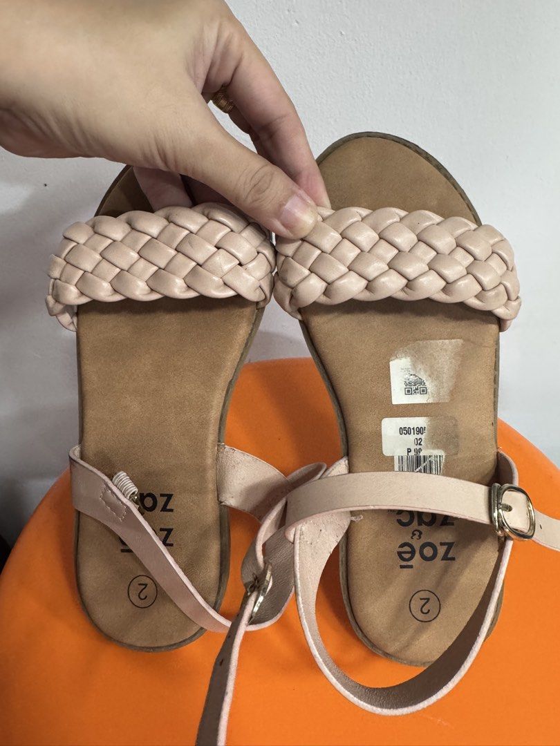 (Payless) Zoë & Zac Pink Braided Strap Sandals Size 2 (Category: Babies & Kids Fashion) located in Valenzuela. Submitted by sofiasticated.decluttering (Listing ID 1470158507, Image 2). Description: - Brand: Zoë & Zac - Color: Soft pink with neutral tan sole - Size: 2 (stamped on footbed) - Details: Braided front strap, adjustable ankle strap with metal buckle - Condition: Clean, ready to wear, original store sticker still on left insole ✨ PRELOVE