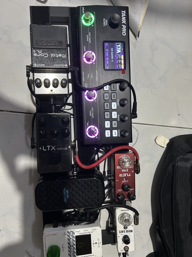 Pedalboard hybrid setup (Category: Musical Instruments) located in Manila. Submitted by eljsansoli64419 (Listing ID 1470263688, Image 1). Description: For sale as set or individual No issues 15k as set Individual price list: Tank pro (brand new with paid presets) - 7k Boss metalcore ML2 (with battery) - 3.5k Caline tuner/power supply - 2k Pedalboard with gig bag - 2k Jcraft ltx drive - 1.5k Yuer compressor - 900 Rowin noise gate - 900 Jamjam vol/