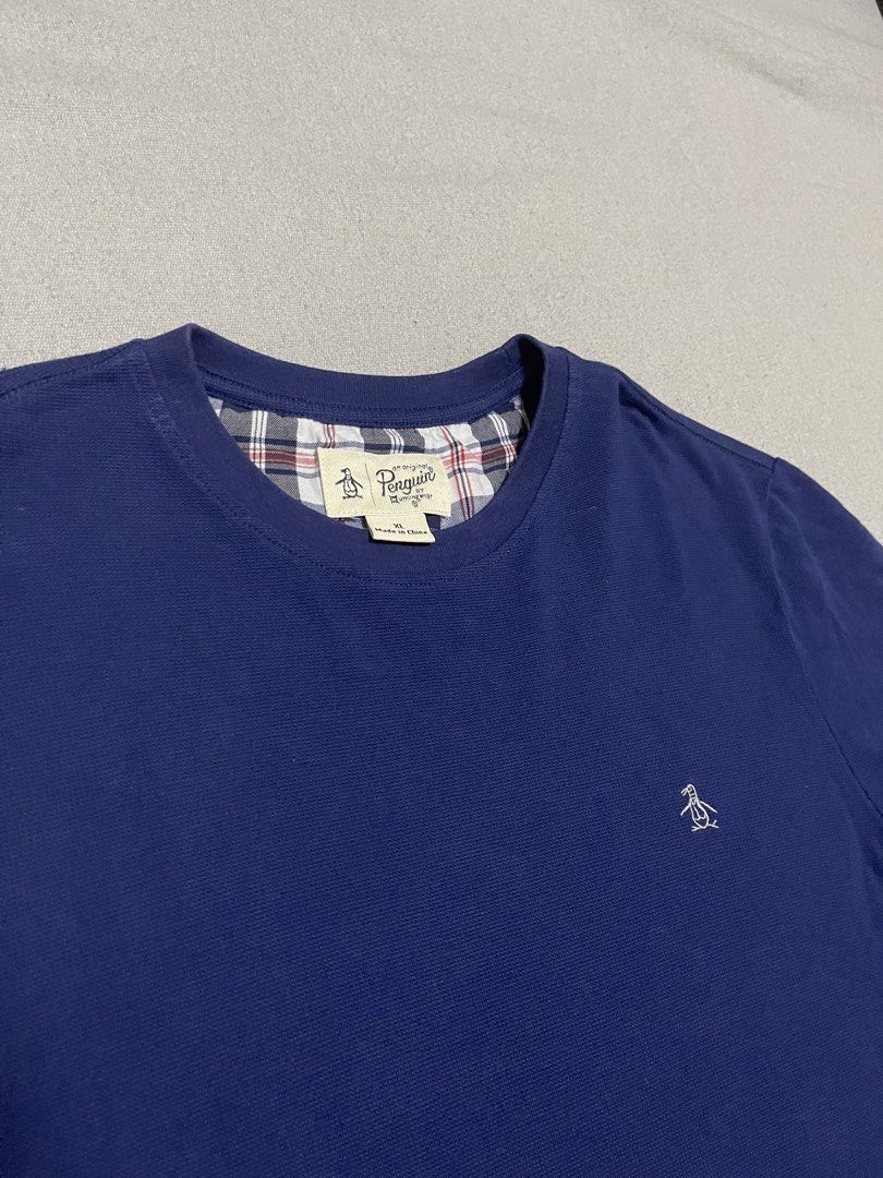 Penguin Embroid Logo Tee (Category: Luxury Apparel) located in Bulacan. Submitted by sanjisthrift (Listing ID 1470175027, Image 2). Description: Size Large to XL Width 21 Length 28 Very Good Condition 9/10.