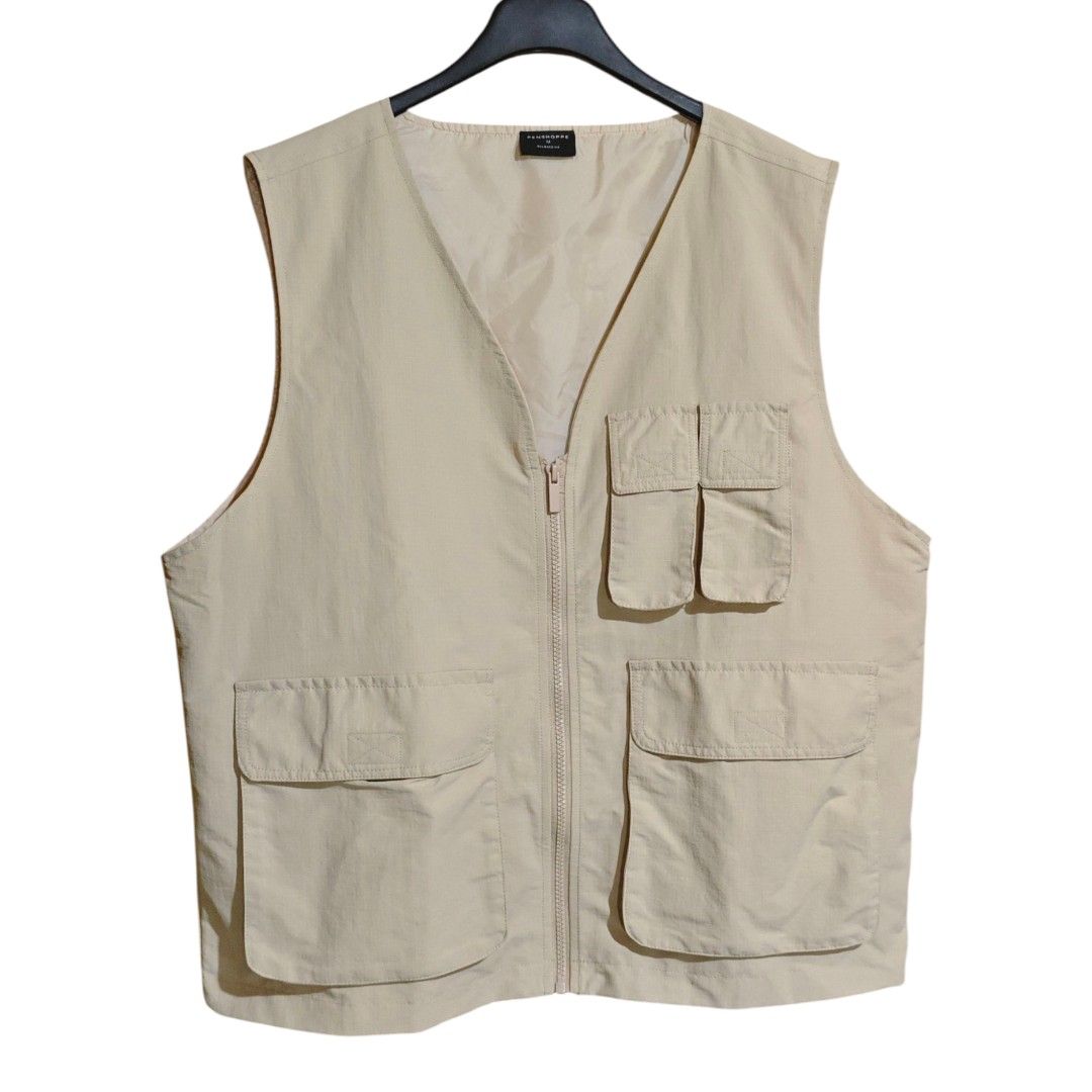 PENSHOPPE Utility Vest (Category: Coats, Jackets and Outerwear) located in Quezon City. Submitted by oldturnedtogold (Listing ID 1470302186, Image 2). Description: PENSHOPPE Utility Vest Size Medium Beige Shoulder Width - 17" Body length - 25.5" Chest Width - 23" Details: - nylon ripstop fabric - lightweight and quick-dry - relaxed fit - 4 front pockets - full zip closure - Shipping fee to be shouldered by the buyer unless otherwise agreed. - Pay