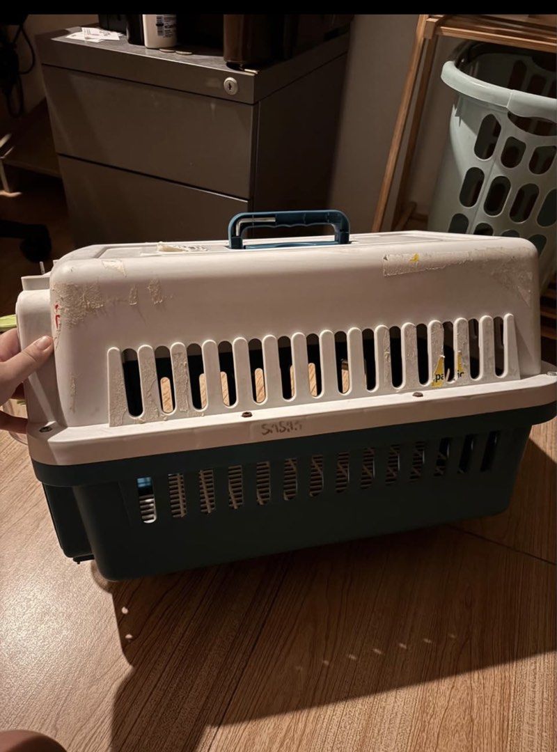 Pet Carrier Crate with Water Dispenser (Category: Health & Grooming) located in Paranaque City. Submitted by donn4u (Listing ID 1470327359, Image 3). Description: - Durable hard plastic pet carrier suitable for cats and small dogs - Secure metal wire door equipped with an easy spring latch - Comes with a convenient hanging water bottle on the front grille - Excellent ventilation with slots along the sides and top - Clean, very sturdy, and ready f
