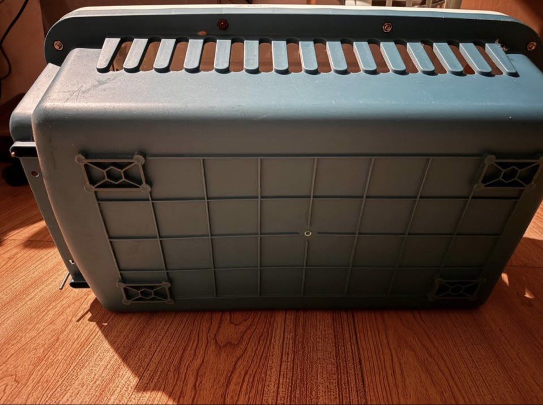 Pet Carrier Crate with Water Dispenser (Category: Health & Grooming) located in Paranaque City. Submitted by donn4u (Listing ID 1470327359, Image 2). Description: - Durable hard plastic pet carrier suitable for cats and small dogs - Secure metal wire door equipped with an easy spring latch - Comes with a convenient hanging water bottle on the front grille - Excellent ventilation with slots along the sides and top - Clean, very sturdy, and ready f