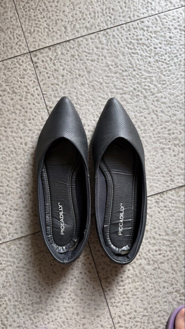 Piccadilly black pointed toe flats (Category: Flats & Sandals) located in Quezon City. Submitted by tylerthepup (Listing ID 1470163871, Image 1). Description: - Brand: Piccadilly - Style: Black pointed flats with slip-on design and minimalist look - Material/Finish: Textured finish all over - Comfort: Soft inner sole with stylish white contrast stitching - Condition: Good everyday wear, with minor wear near the inside heel lining - Versatility: E