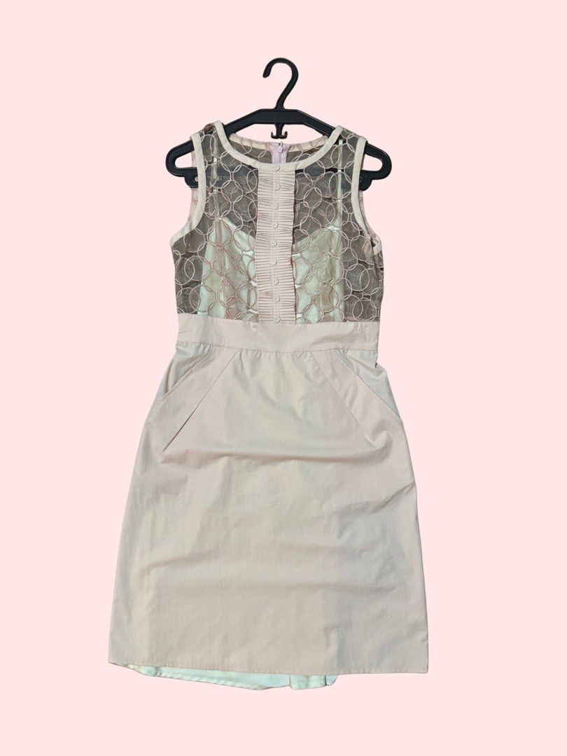 Pink Circle Lace Bodice Sheath Dress (Category: Dresses) located in Pasig City. Submitted by kia.sell (Listing ID 1470296579, Image 1). Description: - Brand: Chloé (100% Authentic) - Design: Sleeveless shift/sheath cocktail dress featuring an intricate geometric circle-lace bodice, pleated button front placket, structured waistband, and a tailored skirt with functional side pockets. - Color: Soft Blush Pink / Nude - Condition: Excellent pre-loved