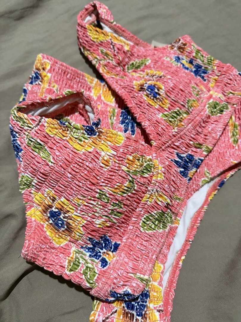 Pink Floral Smocked Two-Piece Bikini Set (Category: Bikinis & Swimsuits) located in Manila. Submitted by kimchimie (Listing ID 1470224186, Image 2). Description: - best fit xs-s - used once - like new condition - padded.