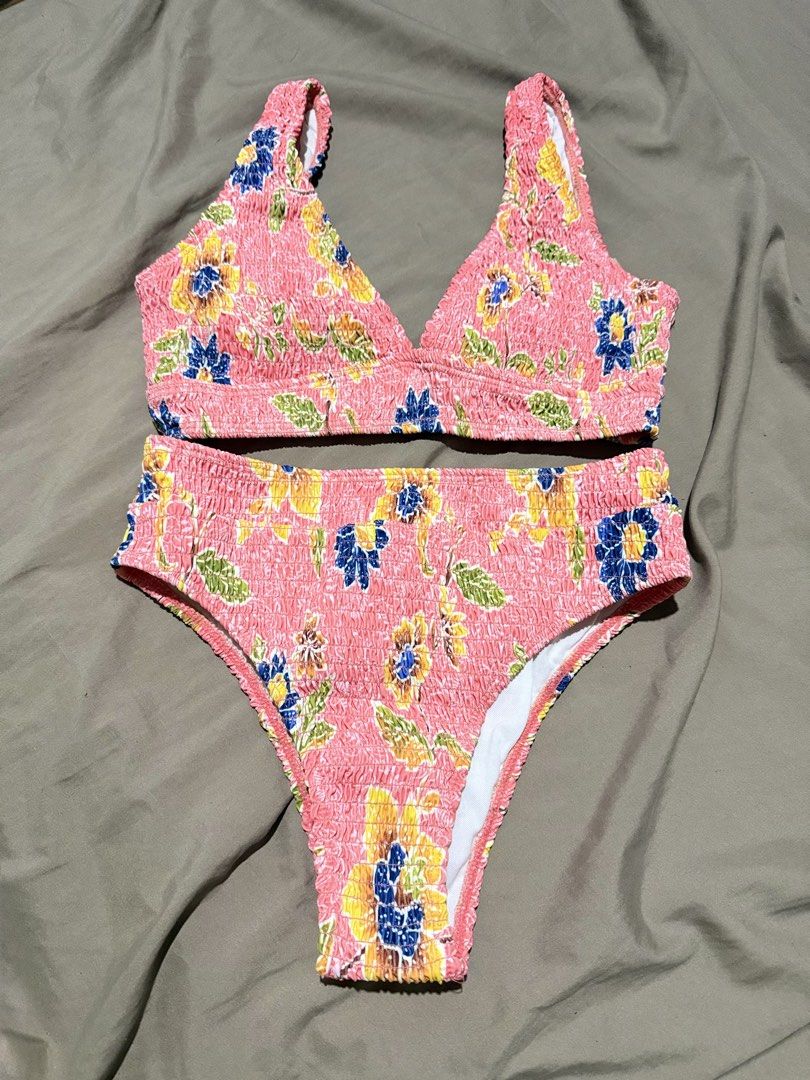 Pink Floral Smocked Two-Piece Bikini Set (Category: Bikinis & Swimsuits) located in Manila. Submitted by kimchimie (Listing ID 1470224186, Image 1). Description: - best fit xs-s - used once - like new condition - padded.